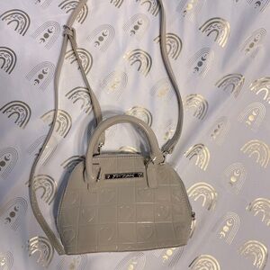 Betsey Johnson Tan Crossbody Bag with Sleek Design